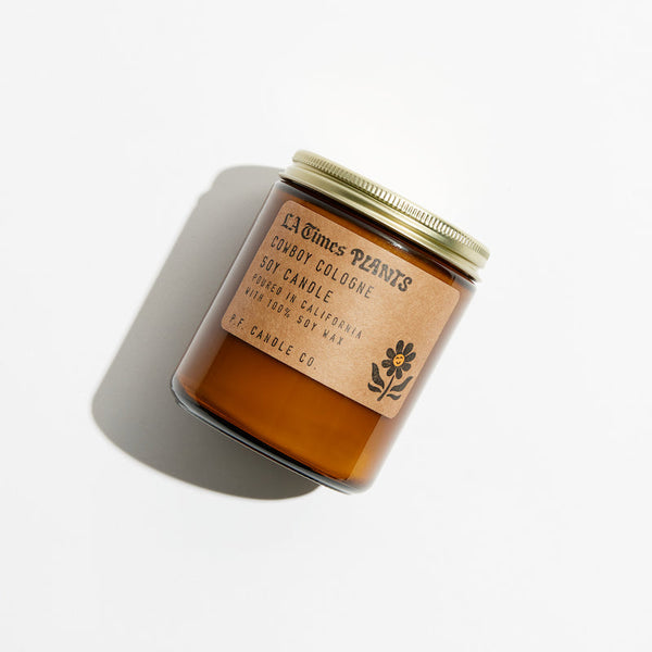 P.F. Candle Co. Cowboy Cologne Walnut for LA Times Plants Standard Candle - Product - Hand-poured into apothecary inspired amber jars with our signature kraft label and a brass lid.